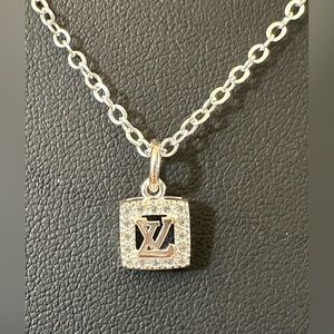 Repurposed. LV charm necklace